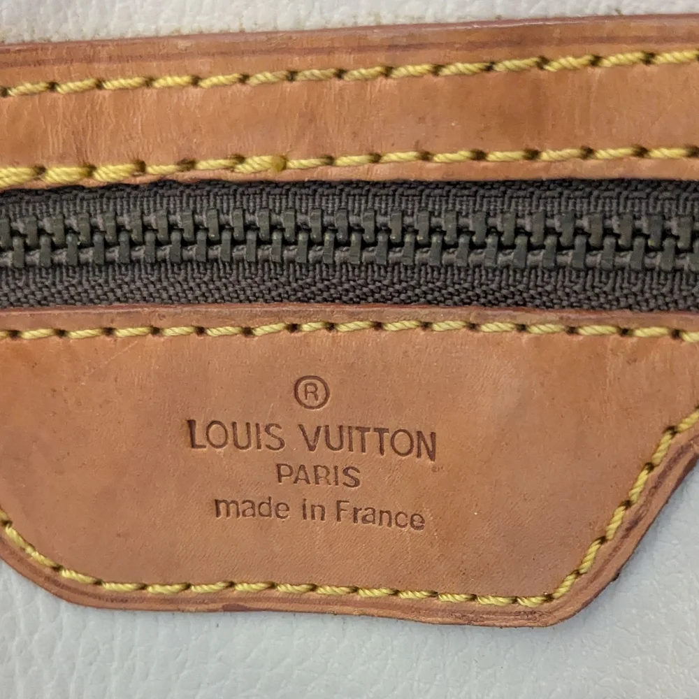 Louis Vuitton Vintage Petit Bucket Bag - Picture 16 of 16